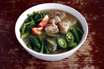 Filipino food called Pork Sinigang or pork and vegetables in tamarind broth
