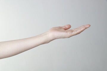 Cropped Hand Of Woman Reaching Out