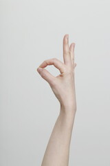 Close up of woman hand making ok sign