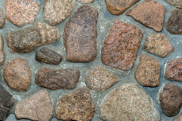 Texture of a stone wall. Old castle stone wall texture background. Stone wall as a background or texture. Part of a stone wall, for background or texture