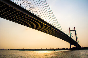 Fototapeta na wymiar Kalkutta Kolkata Indien Ganges Brücke Sonnenuntergang Westbengal