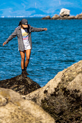 woman jumping on the beach