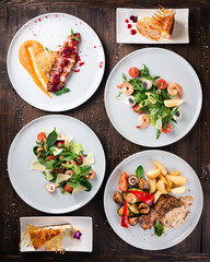 Top view on table food. European and Middle Eastern cuisine. Food for breakfast. Set of dishes on table concept