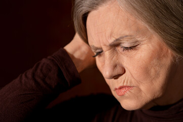 Close up portrait of sad senior woman