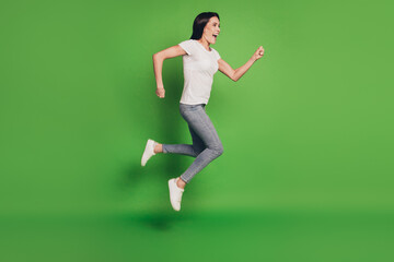 Fototapeta na wymiar Full size photo of jumping woman rushing shopping