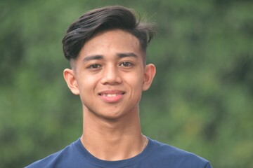 Smiling Young Filipino Teen Boy Closeup