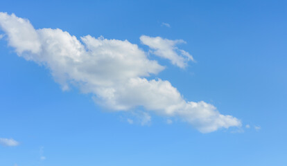 Fototapeta na wymiar Blue sky background with beautiful white clouds.