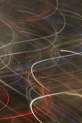 abstract long exposure light streaks with a Christmassy feel suitable for a background