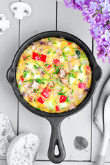 omelette on a purple lilac undercoat