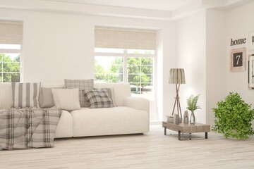 White living room with sofa and summer landscape in window. Scandinavian interior design. 3D illustration