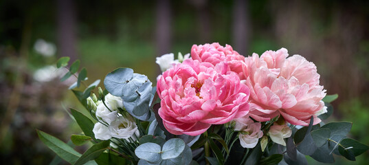 Bouquet with peonies, Paeonia suffruticosa, against blurred background © Frank