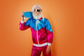 Fashionable grandfather posing with funny clothes.