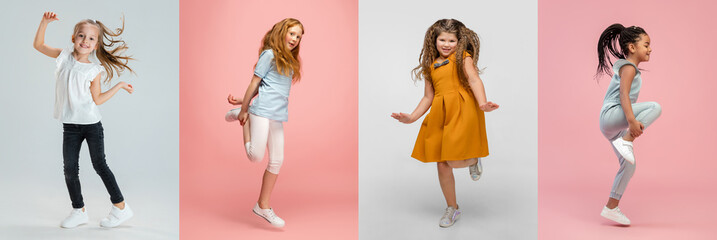 Art collage made of portraits of little and happy kids isolated on multicolored studio background. Human emotions, facial expression concept