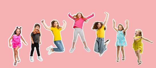Art collage made of portraits of little and happy kids isolated on coral pink studio background. Human emotions, facial expression concept