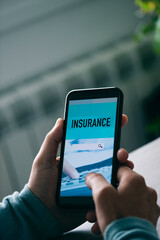 man searching an insurance online