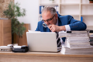 Old male employee and too much work in the office