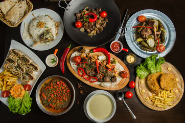 Fototapeta na wymiar Table with various arabic food served. Top view