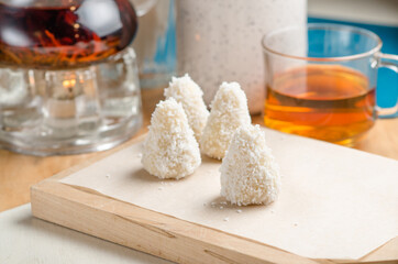 Coconut raw and healthy sugar free candies. Vegetarian energy sweets. Copy space.