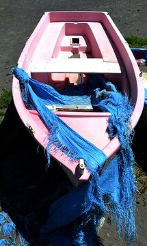 A Pink Boat In The Beach