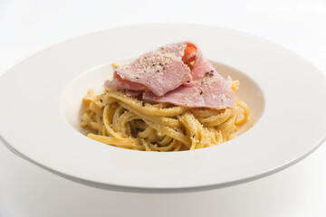 Spaghetti Carbonara with Ham, white background
