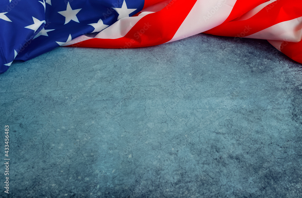 Wall mural memorial day or 4th of july. american flag close up on blue background . national patriotic holiday.