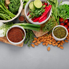 Assorted vegetables and cereal on gray background. Healthy food concept.