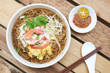 Bowl of Sarawak Laksa, a polular local dish in Sarawak, Malaysia