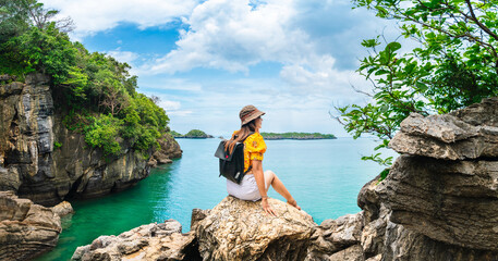 Traveler woman on cliff joy amazed nature scenic landscape Ko Khao Yai, Adventure attraction outdoor place tourist travel Satun Thailand beach holiday vacation trip, Tourism beautiful destination Asia