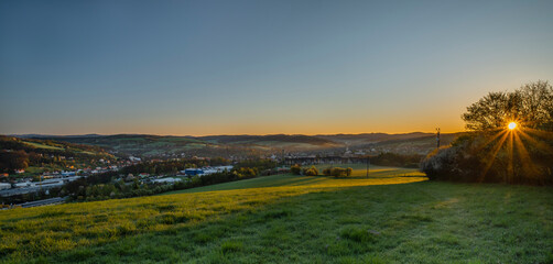 Obraz premium Vizovice town with sunrise of orange sun and fresh color air