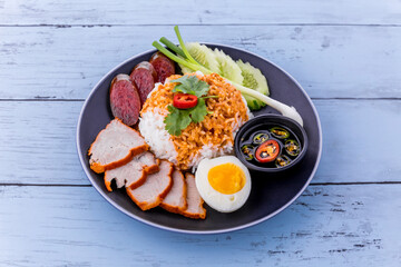 Barbecued red pork in sauce with rice