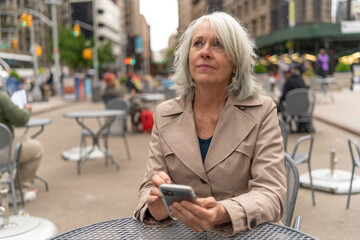 Fototapeta premium Mature caucasian woman in city