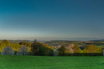 Meadows over Vizovice town with sunrise and fresh color air in east Moravia