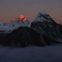 Peak of Mount Everest at sunset.