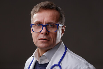 Middle-aged male doctor or nurse with intense expression