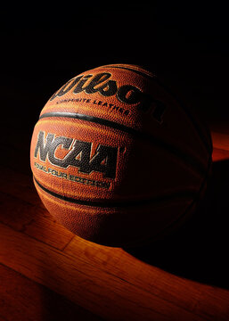 Wilmington,NC - USA - 05-07-2021: An NCAA Final Four Edition Basketball On Hardwood Background