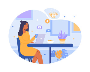 Girl using laptop working and drinking coffee