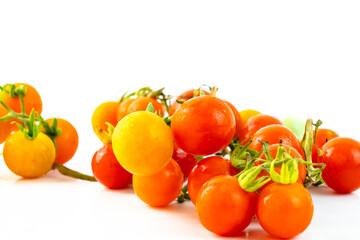 Cherry tomatoes. Fresh ripe cherry tomatoes closeup isolated on white background