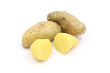 raw potatoes on white background