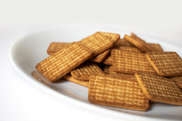 indian biscuits wheat biscuits in the plate white background