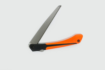 10-inch folding garden saw with orange handle on White Background