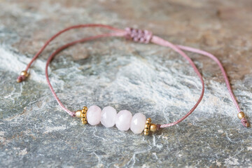 Morganite cubic cut mineral stone bead bracelet on natural background