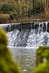 Obraz premium A waterfall in Bristol, Snuff Mills Park