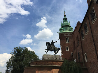 The Tadeusz Kościuszko Monument and the Sigismund Tower at the Wawel Castle Complex in Krakow, Poland