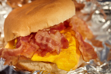 Bacon and egg sandwich on a bun. Typical breakfast sandwich in rural America.