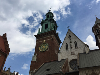 The Clock Tower, Holy Cross Chapel (right) and Holy Trinity Chapel (left) at the Wawel Castle Complex in Krakow, Poland