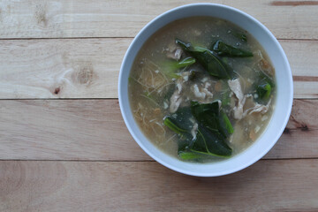 Fried soup noodles, Pork, and Kale with sauce in the bowl, delicious food Thai people called 