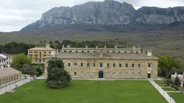 Bosco di Ficuzza with the Real Casina di Caccia Ficuzza commissioned by the Bourbon King Federico III of Sicily. Sober and elegant building dominated by the Rocca Busambra.