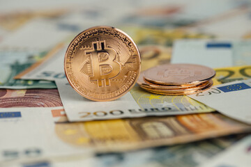 Money background. USA dollar with Euro Banknotes and Bitcoin cryptocurrency investing concept.