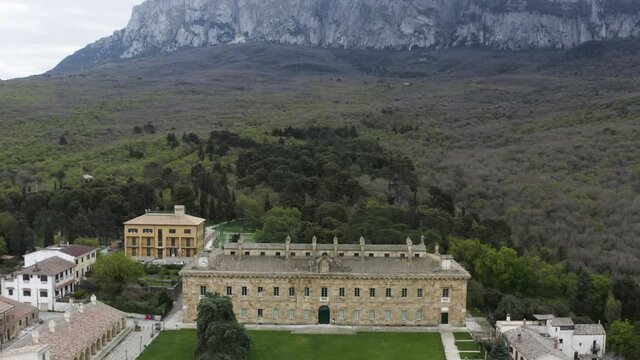Bosco di Ficuzza with the Real Casina di Caccia Ficuzza commissioned by the Bourbon King Federico III of Sicily. Sober and elegant building dominated by the Rocca Busambra.