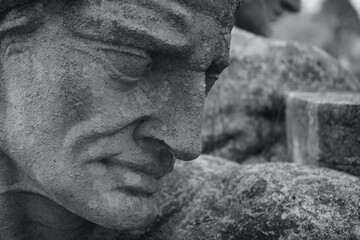 Close up of a male head within the historic group of public statues by Albert Hodge representing...